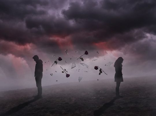 Silhouetted couple standing back to back in emotional distance surrounded by wilted roses and shattered glass fragments against a dark moody atmosphere with dramatic lighting